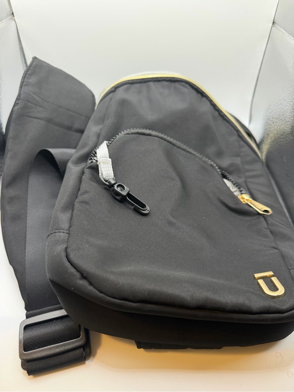 Ful Men's Black Sling Belt Bag with Gold Hardware